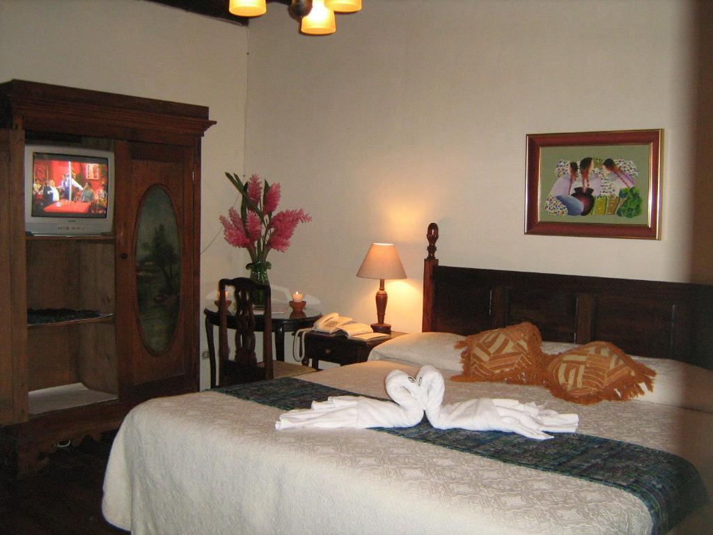 Hotel Posada De Maria Antigua Camera foto