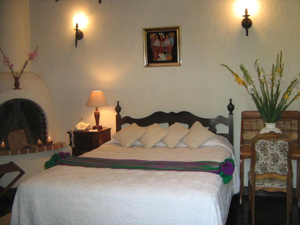 Hotel Posada De Maria Antigua Camera foto